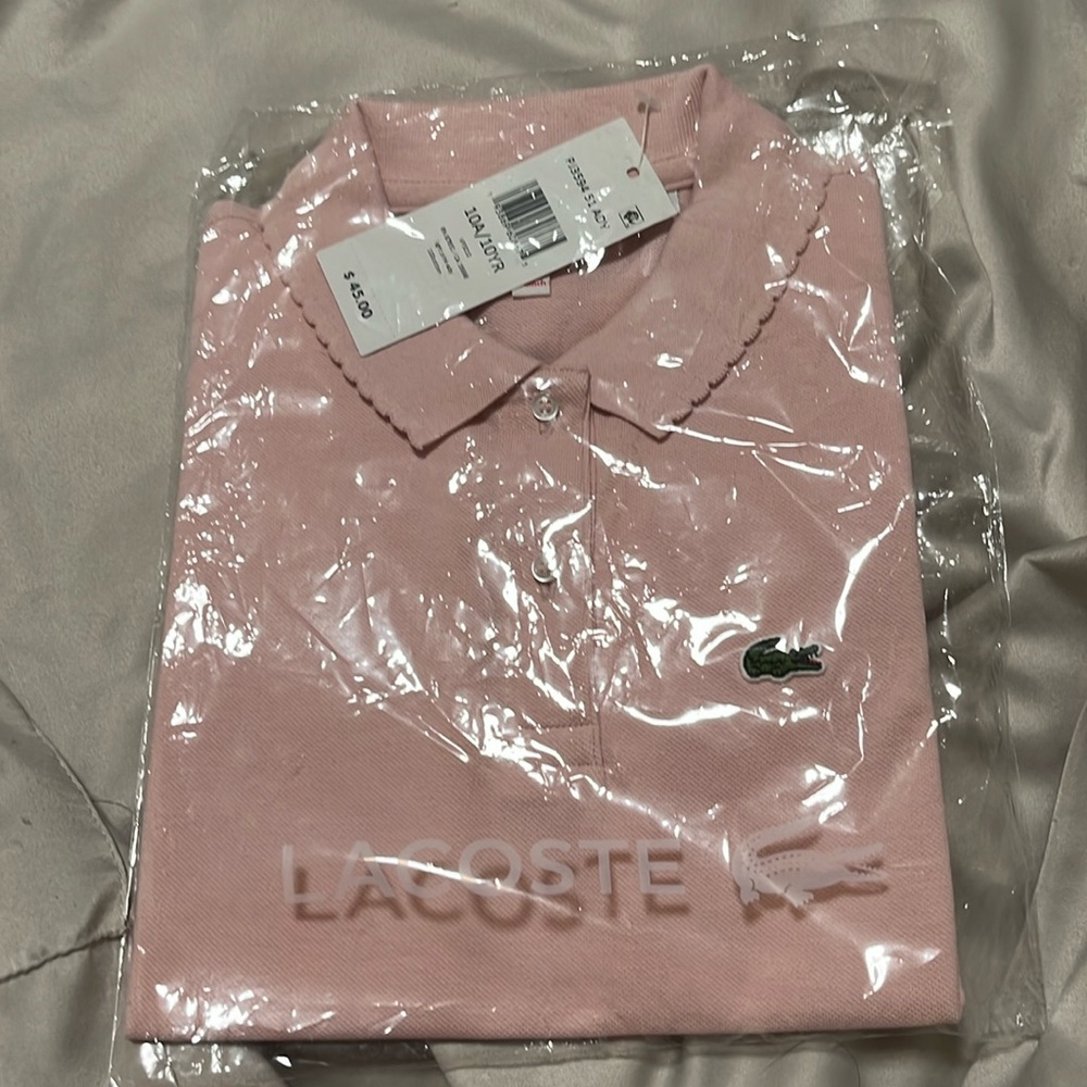 Lacoste pink polo shirt for girls. Size 10